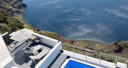 Hara's Houses, a unique cliffside villa with 5 private studios sharing a pool.