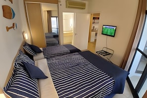 Fer et planche à repasser, draps fournis