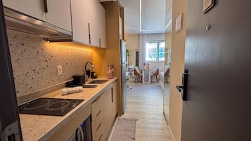 Coffee/tea maker, fridge, microwave, toaster