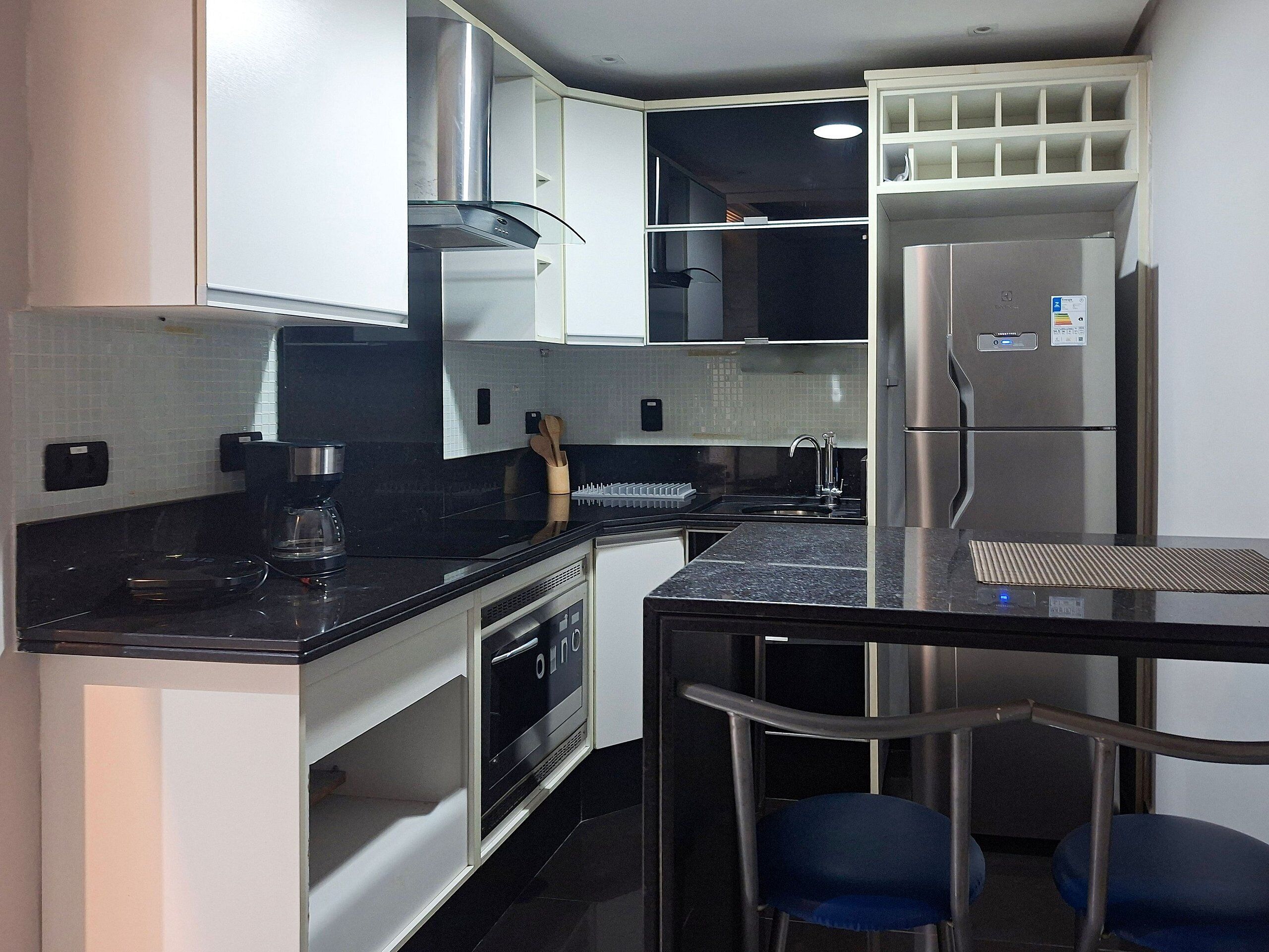 Fridge, oven, cookware/dishes/utensils