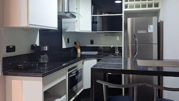 Fridge, oven, cookware/dishes/utensils