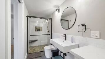 Shower, hair dryer, towels, soap