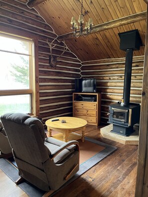 Living area - Quaint and Cozy Cabin with a Loft (Bondurant)