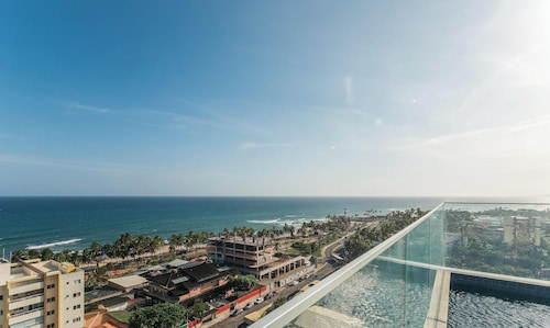 Sua estadia com conforto em prédio c/ piscina e a Praia a Poucos Passos - PSPs