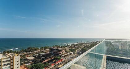 Sua estadia com conforto em prédio c/ piscina e a Praia a Poucos Passos - PSPs