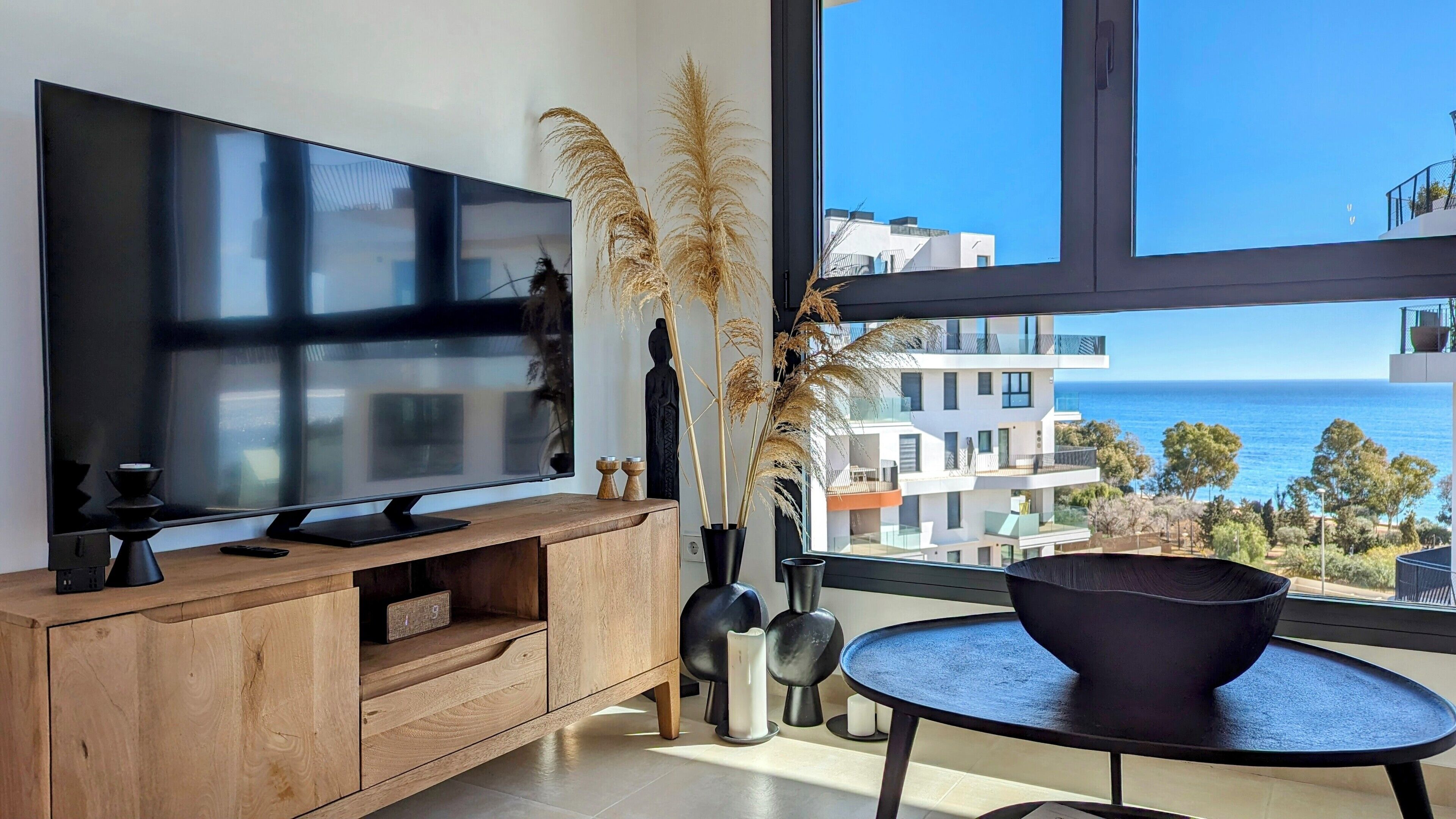 Design & Spa Apartment | Living area | 40-inch Smart TV with digital channels