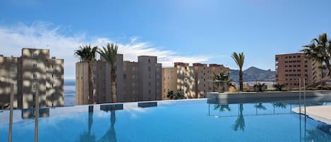 Seasonal outdoor pool, sun loungers