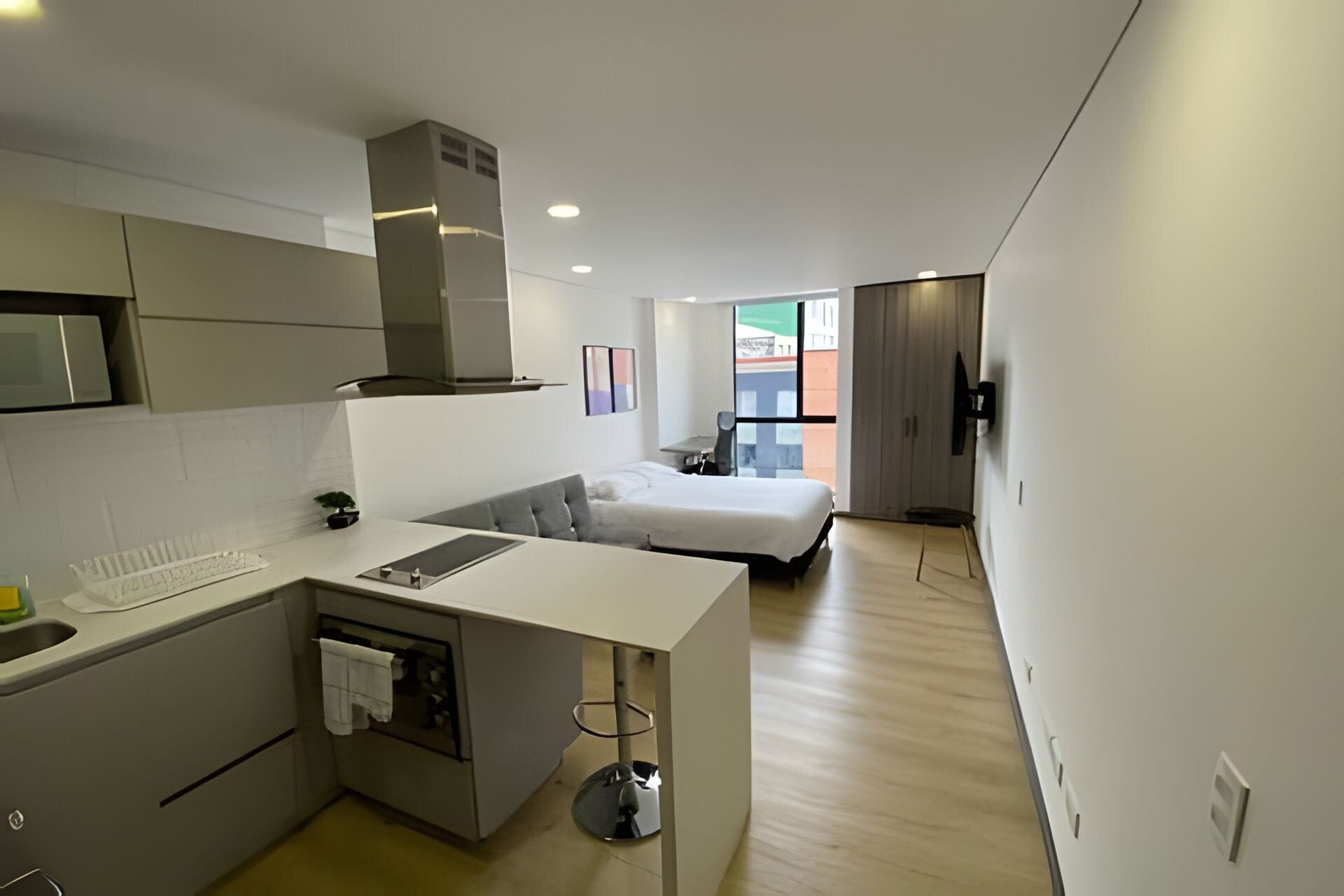 Apartamento econômico | Cortinas blackout, ferros/tábuas de passar roupa, Wi-Fi de cortesia