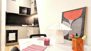 Microwave, stovetop, coffee/tea maker, electric kettle