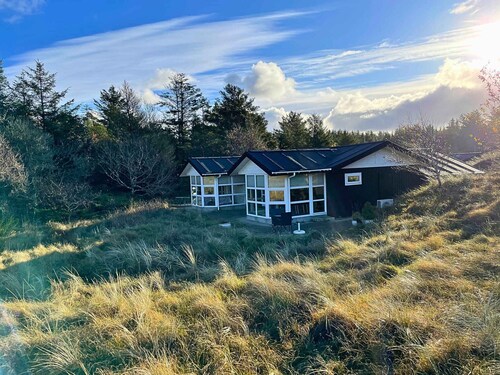 Elegant home with views of protected landscape