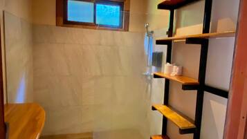 Shower, towels, soap, toilet paper