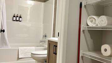 Hair dryer, towels, soap, toilet paper