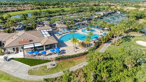 A resort with a swimming pool, tennis courts, and a golf course. - Private River Strand pool home with golf membership - Villa Milano (Bradenton)