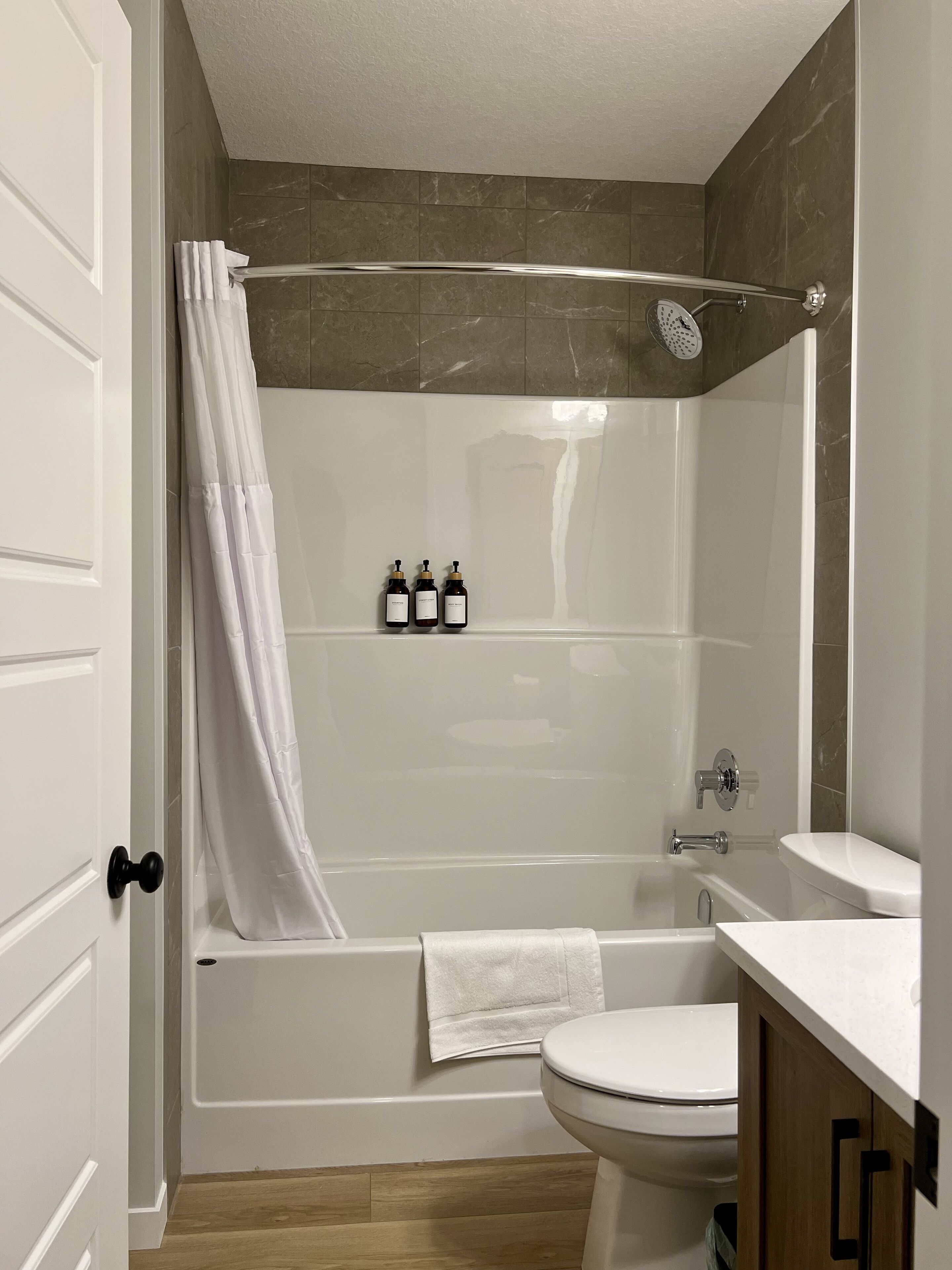 Hair dryer, towels, soap, toilet paper