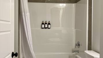 Hair dryer, towels, soap, toilet paper