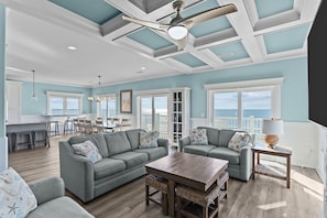 Smart TV, fireplace - Clear Skies: Spacious 7-Bedroom Oceanfront Retreat in Oak Island, NC, perfect for up to 20 guests. (Oak Island)