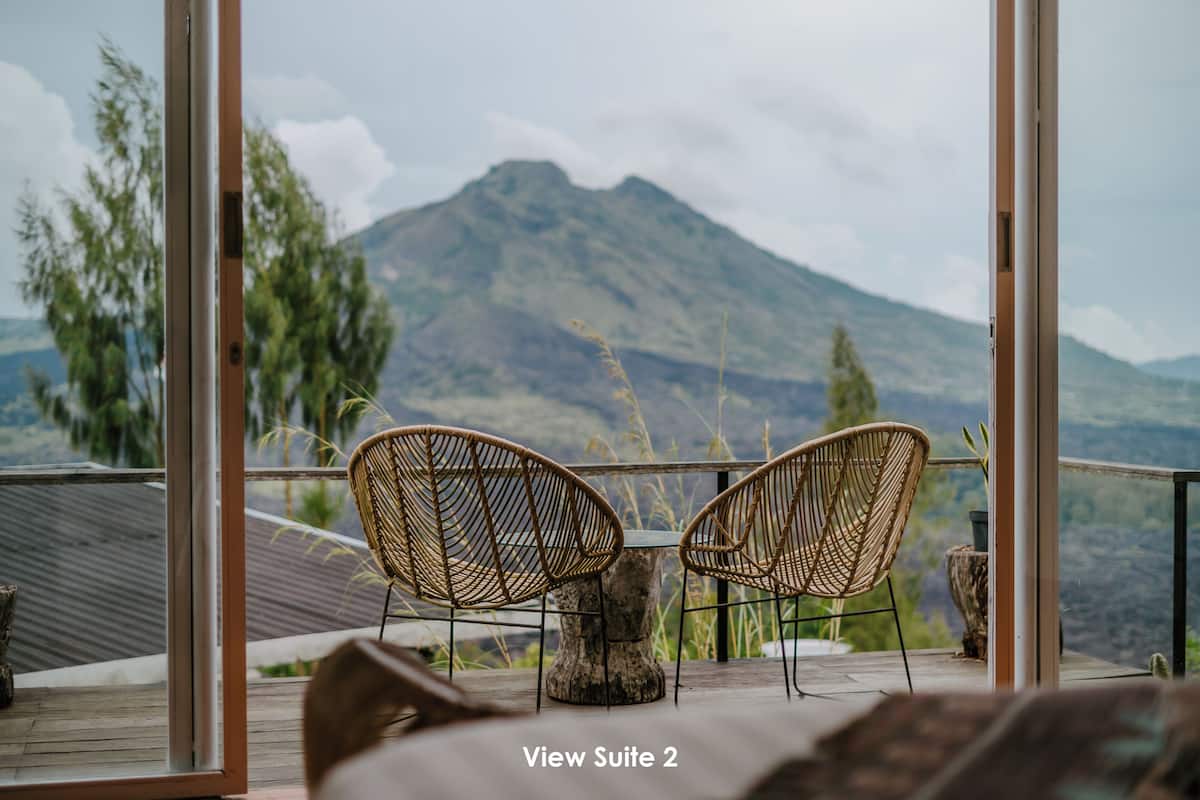 Quarto família, 1 cama Queen, vista para a montanha | Roupa de cama