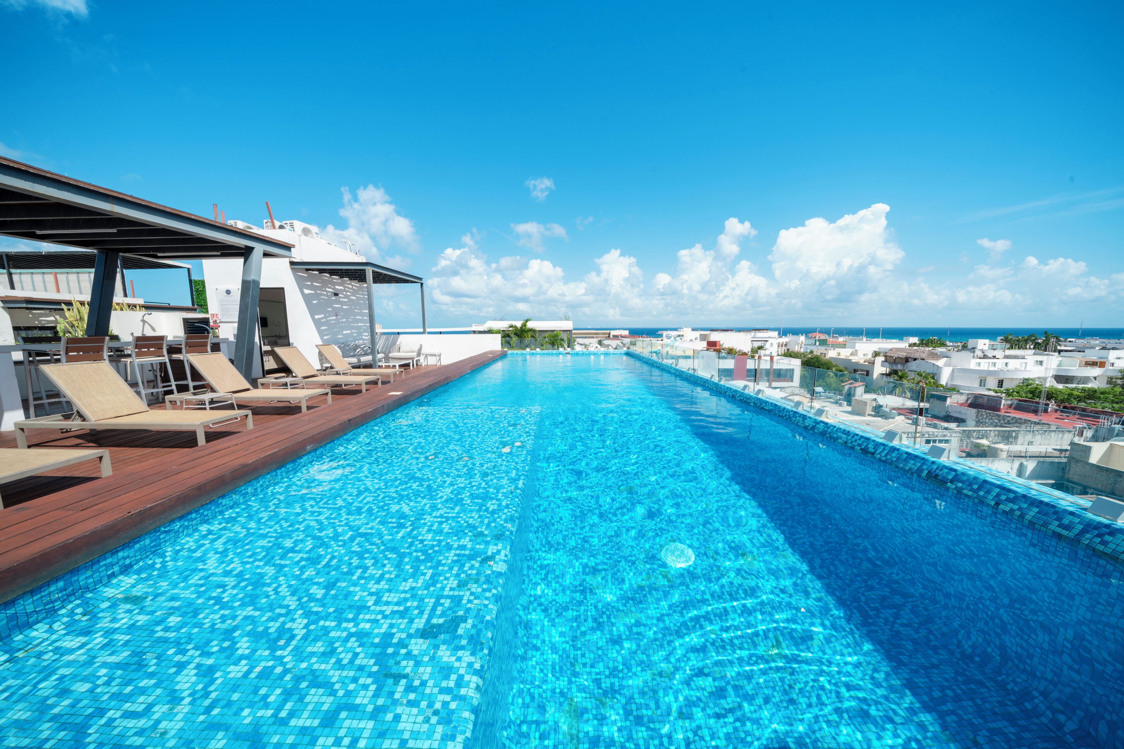 Outdoor pool, pool umbrellas, sun loungers