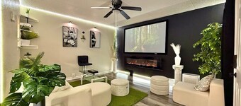 The Elevé Suite|Cinema Lounge Fireplace|Gulf Coast