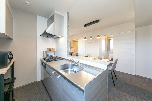 Superior Suite, Non Smoking, City View | Private kitchen | Full-size fridge, microwave, electric kettle, cookware/dishes/utensils