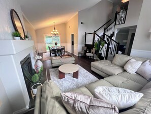 Smart TV, fireplace, table football, books