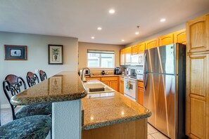 Fridge, microwave, stovetop, coffee/tea maker