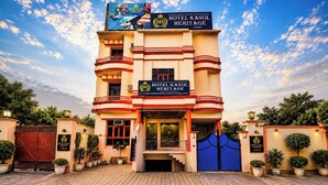 A multi-story hotel with a prominent sign reading 'HOTEL KASOL HERITAGE.'