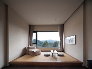 Deluxe Double Room, Mountain View | Minibar, individually decorated, individually furnished, free WiFi