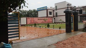 A hotel entrance with a sign reading "Hotel Aayes & Resort." - Hotel Aayes & Resort (Bolpur)
