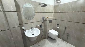 Shower, slippers, towels, soap