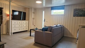 Apartment, Multiple Bedrooms, Fireplace, Garden View | Room amenity - Apartment i Syd, Lindesnes (Lindesnes)