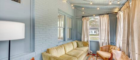 TV, fireplace, books