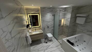 Executive Suite, Balcony, Mountain View | Bathroom | Hair dryer, slippers, towels, soap