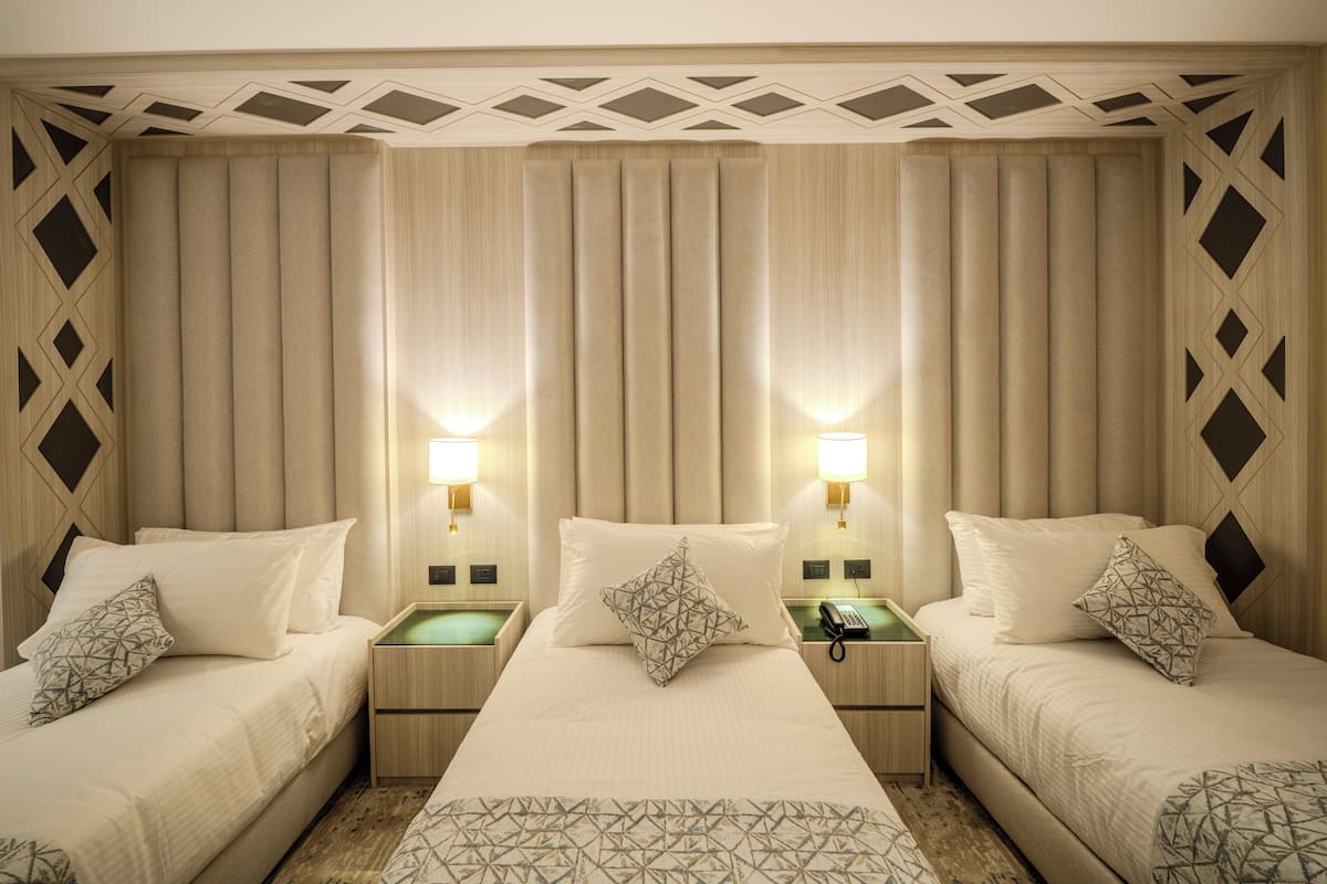 Chambre Triple Deluxe, vue montagne | Bureau, chambres insonorisées, fer et planche à repasser, Wi-Fi gratuit