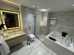 Executive Suite, Balcony, Mountain View | Bathroom | Hair dryer, slippers, towels, soap