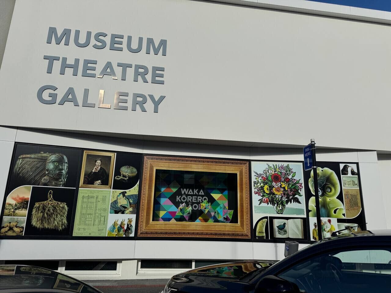 A building with a sign that reads "Museum Theatre Gallery".