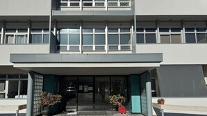A modern building with a flat facade, large windows, and a covered entrance. - Chic 2 Bedroom Apartment in Art Deco Napier (Napier)