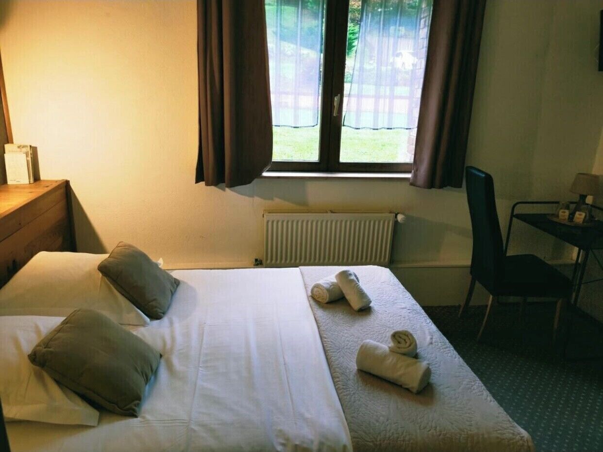 غرفة مزدوجة عادية - منظر للمدينة | تجهيزات عازلة للصوت وواي فاي مجانًا وتسهيلات لدخول الكراسي المتحركة