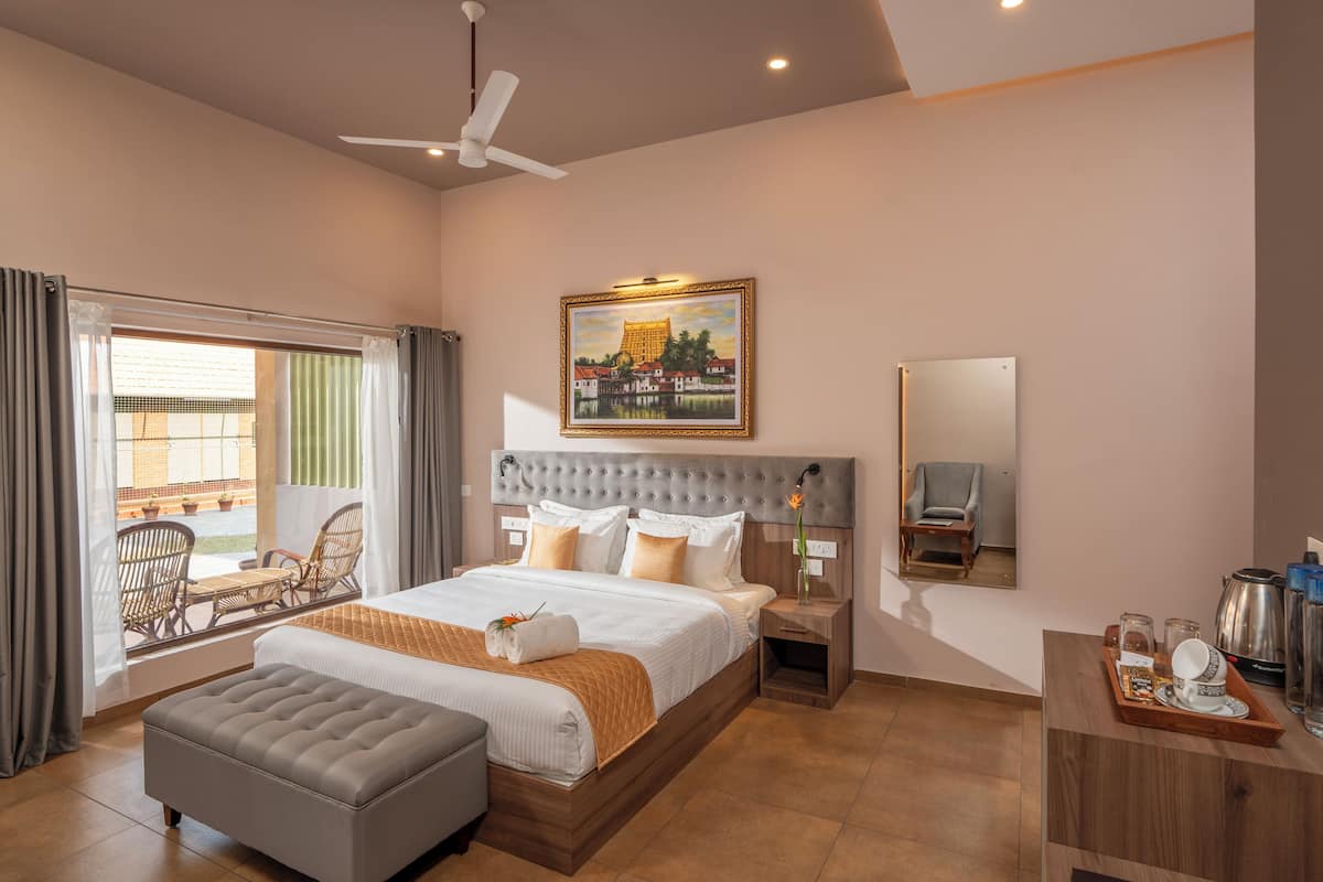 Deluxe Double Room, Patio, Courtyard View | Desk, laptop workspace, blackout drapes, soundproofing