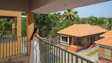 Deluxe Double Room, Balcony, Courtyard View | Desk, laptop workspace, blackout drapes, soundproofing