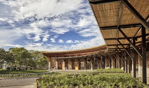 A traditional-style building with a curved roof and open pavilion structure. - Four Seasons Resort Costa Rica At Peninsula Papaga (Nacascolo)