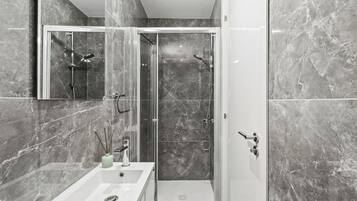 Shower, free toiletries, hair dryer, towels