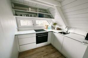 Fridge, oven, stovetop, dishwasher - Lakeside cabin Sonnenschilf (Rust)