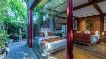 Chambre Triple Deluxe, vue jardin | Vue sur le jardin