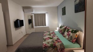 2 habitaciones, tabla de planchar con plancha y wifi gratis 