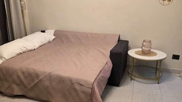 Fer et planche Ă repasser, draps fournis