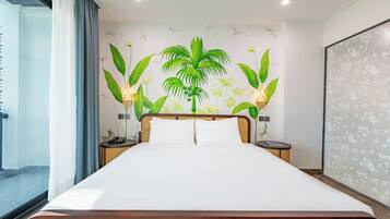 Deluxe Double Room, Pool View | In-room safe, desk, laptop workspace, soundproofing