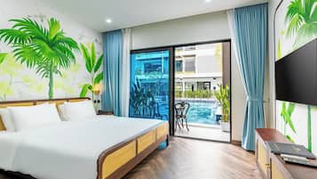 Junior Double Room, Pool View | In-room safe, desk, laptop workspace, soundproofing