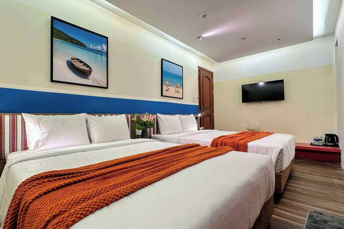 Family Room, Non Smoking, City View | Laptop workspace, blackout curtains, iron/ironing board (on request)