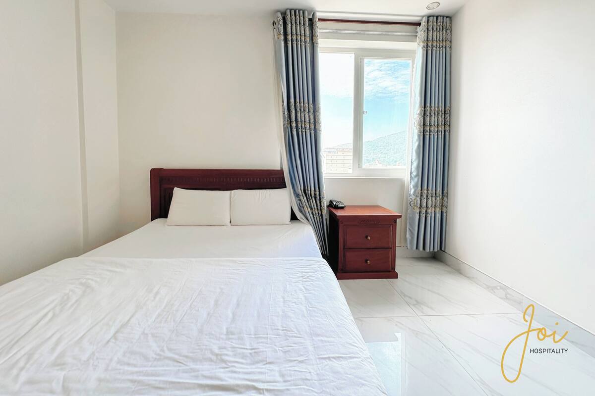 Deluxe Double Room, City View | Laptop workspace, blackout drapes, iron/ironing board, free WiFi